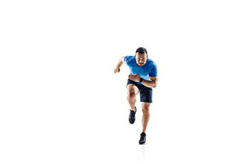 Fototapeta na wymiar In air. Caucasian professional male athlete, runner training isolated on white studio background. Muscular, sportive man. Concept of action, motion, youth, healthy lifestyle. Copyspace for ad.