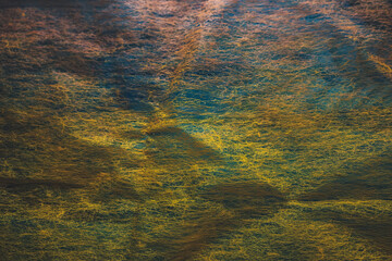 abstract background of colorful textile over contrast wood