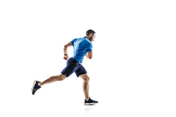 Purpose. Caucasian professional male athlete, runner training isolated on white studio background. Muscular, sportive man. Concept of action, motion, youth, healthy lifestyle. Copyspace for ad.