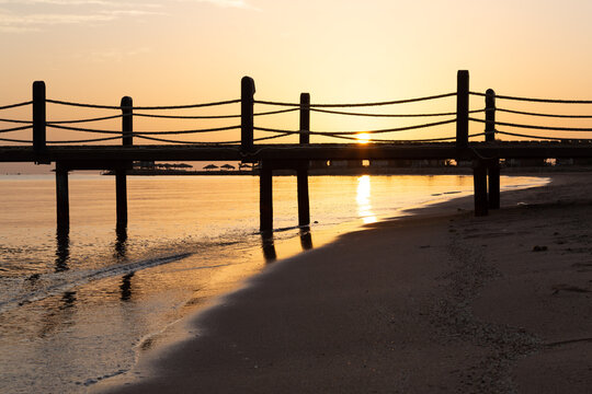 sunrise on the beach with reflection