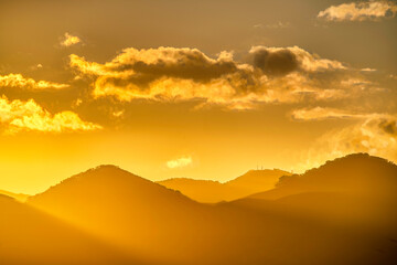 Yellow Sunset in the Mountains, Silhouette Clouds 