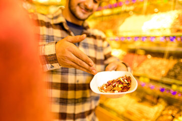 Turkish man selling tea in his own shop in Istambul bazar