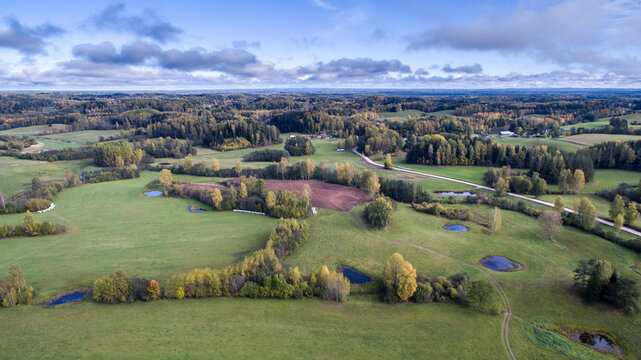 Aerial shot of beautiful Karula National Park full of lakes in Estonia