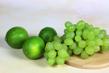 lime and grapes on the table, antioxidants and vitamin C 