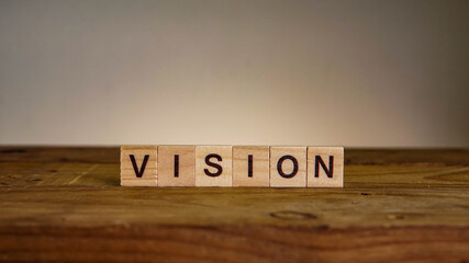 VISION wording on wooden table