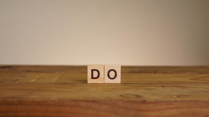 DO wording on wooden table