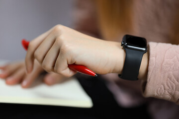 hand with smart watch put on, using gadgets 