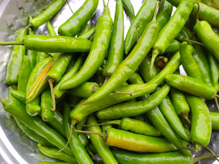 Pile of green serrano pepper