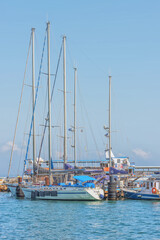Fototapeta premium Yacht in harbor of Old Akko, the coastal ancient city of Israel