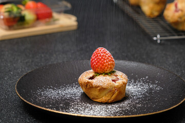 Homemade Strawberry cake topping with icing sugar. Sweet food. Sweet dessert. perfect summer season dessert served on plate.