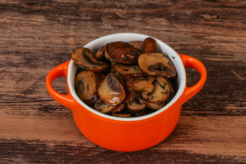 Roasted champignon with herbs and spices