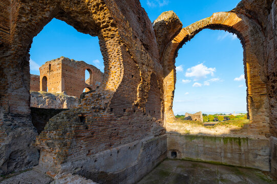 Detail of the  apse of Nymphaeum of the Villa dei Quintili on the Appia Antica in Rome, on a sunny summer day and blue sky with the window. The regina viarum that connected Rome to Brindisi, Italy.