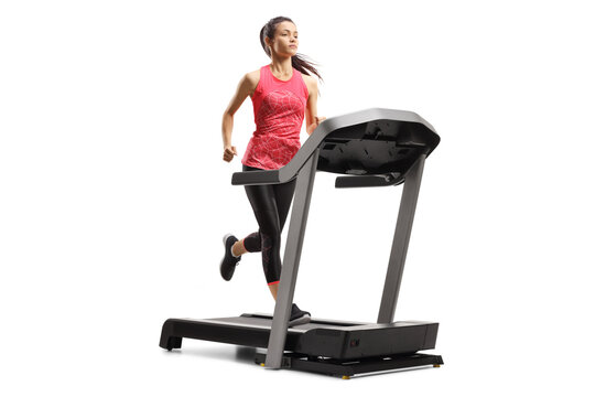 Young female athlete running on a treadmill