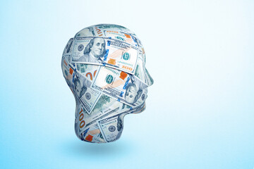 human head made by 100 dollar banknotes. Idea to earn money. The concept of money addiction,...