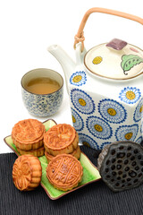 Mooncake and tea,Chinese mid autumn festival food on white background