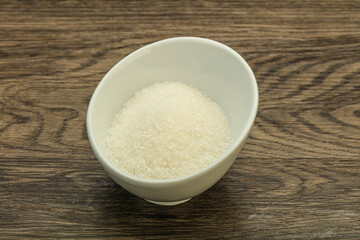White sugar in the bowl