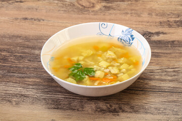 Tasty chicken soup with carrot