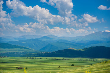 Summer landscape with field and mountains, Armenia