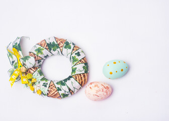 Easter composition with a wreath in bright colors. Background for greeting card, easter background, place for text 