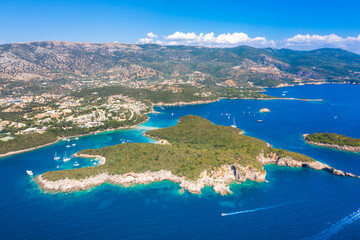 Aerial view of iconic paradise sandy beaches with turquoise sea in complex islands of Agios Nikolaos and Mourtos in Sivota area, Epirus, Greece