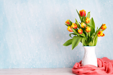 Beautiful Blank Card for Easter, March 8, valentines day, Mothers day. Red and yellow tulips in a white jar.