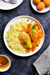 Chicken breasts in apricot sauce and couscous