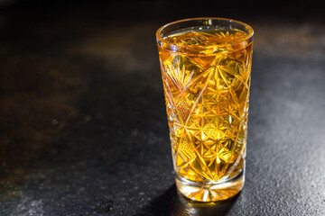 cocktail beverage alcoholic drink transparent glass ice cube lemon mint portion on the table meal outdoor top view copy space for text food background rustic image