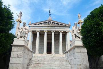 The Academy of Athens is a neoclassical building  in the centre of Athens. The statues of Plato and Socrates on the stairs in front of it