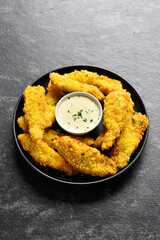 Crispy fried breaded chicken breast strips