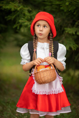 the girl in the wood looks up. the fairy tale 