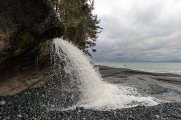Waterfalls on the beach at Jordan River Regional Park on Vancouver Island