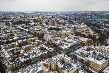 Cityscape of Odessa with cargo port on right after snow blizzard on February 8, 2021.