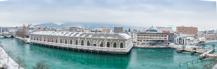 GENEVA, SWITZERLAND - February 11, 2021: View on Batiment des Forces Motrices on Rhone from Rue de Sous-Terre, Geneva.