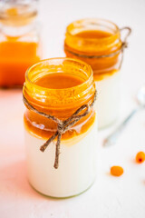 yogurt or cottage cheese with homemade sea buckthorn jam. Healthy breakfast. Low-calorie food.