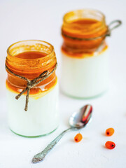 yogurt or cottage cheese with homemade sea buckthorn jam. Healthy breakfast. Low-calorie food.