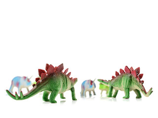 Fototapeta premium dinosaurs toys on white background