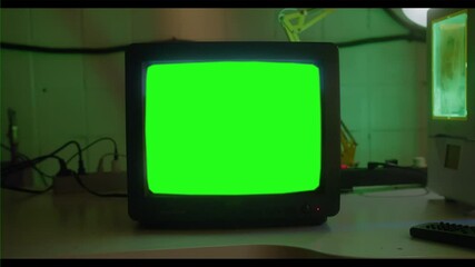 Vintage Television Set Green Background with Noise and Static. Zoom Out. You can replace green screen with the footage or picture you want with “Keying” effect in AE (check tutorials in YouTube).