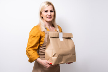 picture of attractive businesswoman delivering box