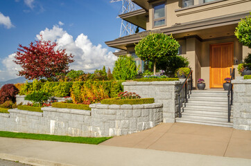 A perfect neighbourhood. Houses in suburb at Summer in the north America. Luxury houses with nice landscape.