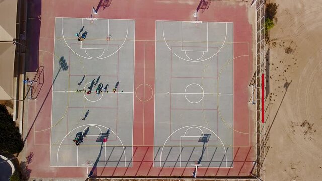 View from height to the basketball court with players during training