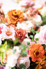 wedding ceremony is decorated with flower arrangements