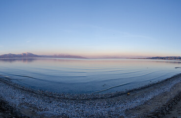 sunset over the sea lake oropos greece