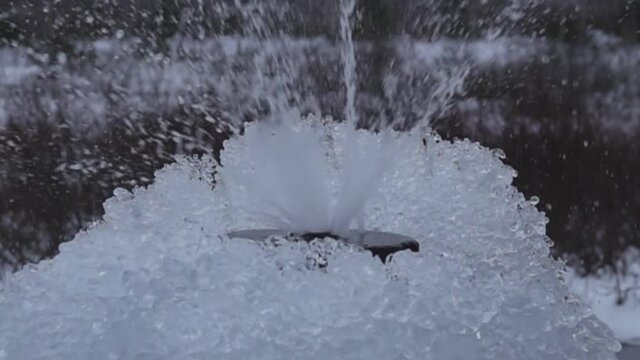 Frozen fountain, the spray of the fountain. Super slow motion 1000 fps.
