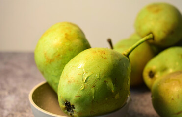 Healthy life, healthy food. Green pear with more units at the bottom.  Great contribution of water and vitamins.