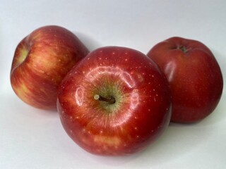 red apples on a white background