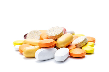 various pills, tablets and capsules isolated on white background. medication drugs cut out