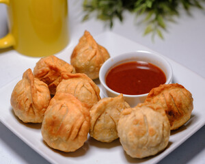 Indian Food Kachori with Red chutney on Side