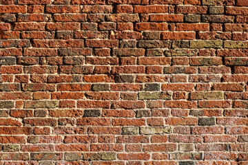 old red and yellow bricks on the wall texture