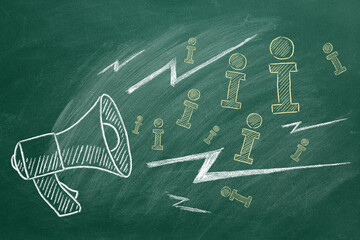 Megaphone with  info icons hand drawn in chalk on a greenboard. FAQ concept.  Important announcement. 