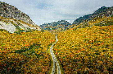 New Hampshire's White Mountains ablaze with autumn foliage.  Franconia Notch
